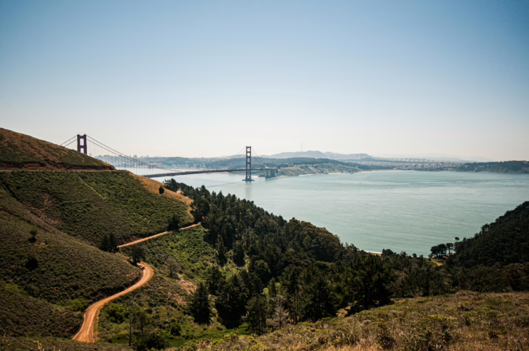 Scenic landscape of Golden Gate Bridge from Marin Headlands, showcasing the natural beauty of San Francisco.